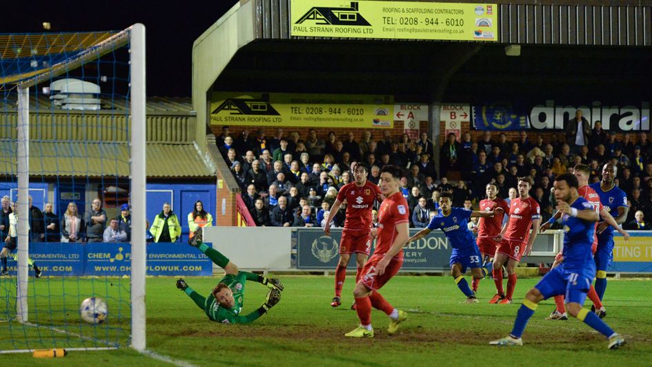Lyle Taylor scores AFC Wimbledon against MK Dons in 2017