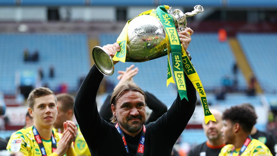 Daniel Farke with the Sky Bet Championship trophy