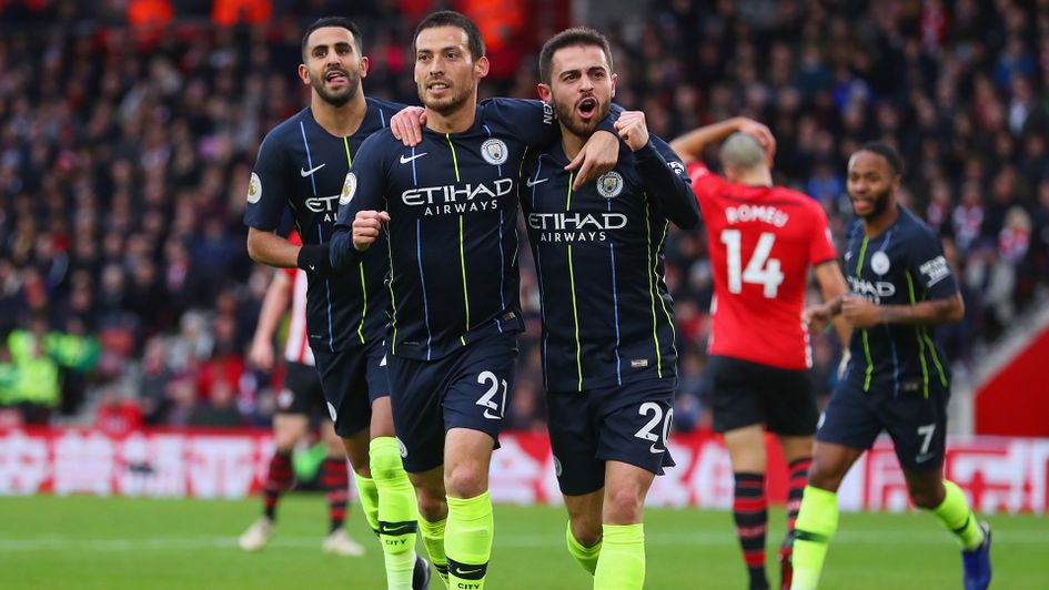 David Silva (centre) celebrates after giving Manchester City the lead against Southampton