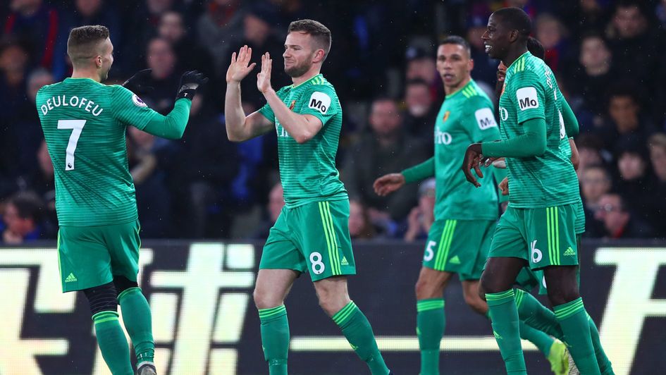 Celebrates for Tom Cleverley (centre) and Watford