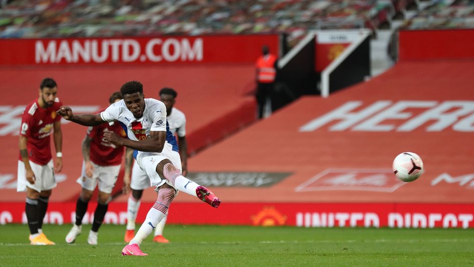 Wilfried Zaha scores his penalty against Manchester United