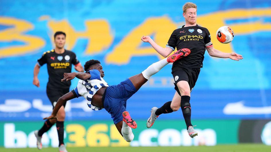 Yves Bissouma challenges Kevin De Bruyne