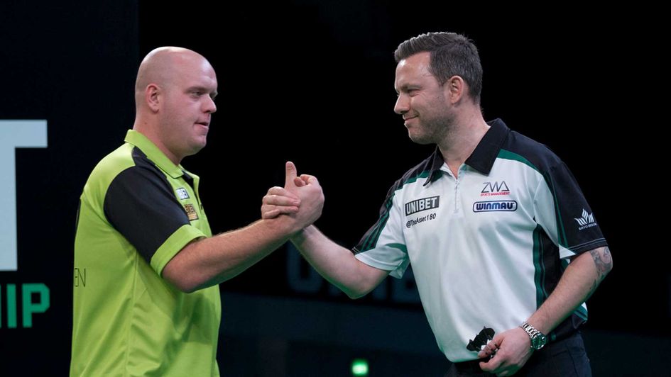 Michael van Gerwen and Paul Nicholson shake hands (Picture: Kelly Deckers/PDC)