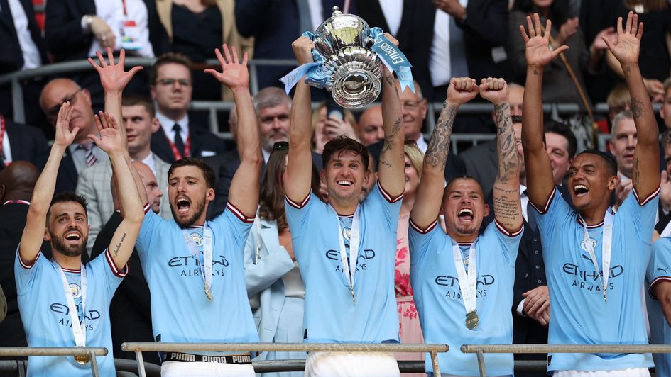 John Stones lifts the FA Cup