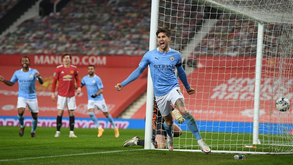 John Stones celebrates his goal against Manchester United