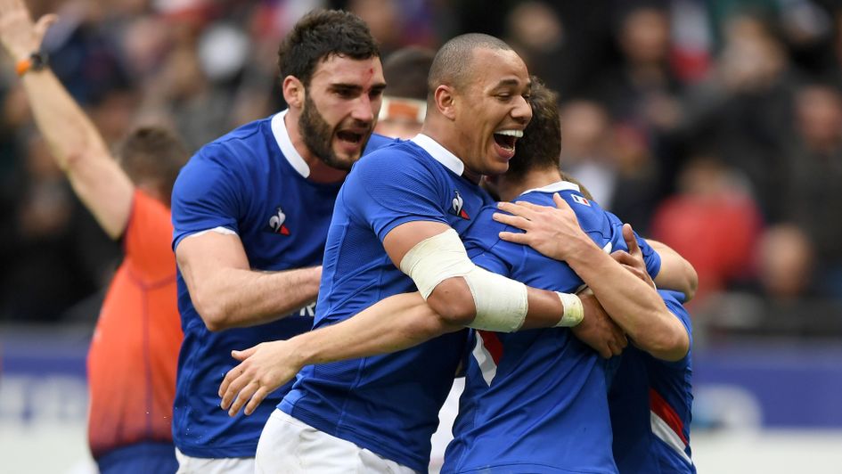 France celebrate after scoring a try