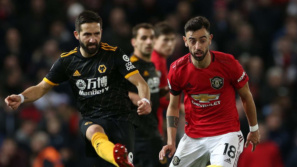 Bruno Fernandes and Joao Moutinho during Man Utd v Wolves