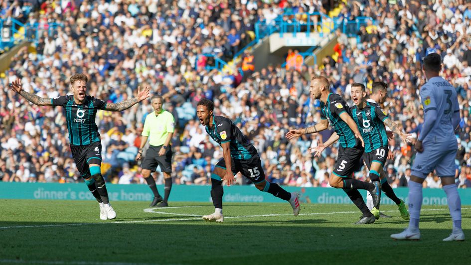 Swansea celebrate their winner against Leeds