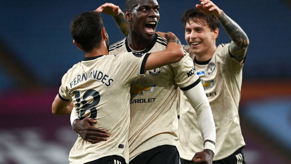 Paul Pogba is congratulated after scoring Manchester United's third goal against Aston Villa