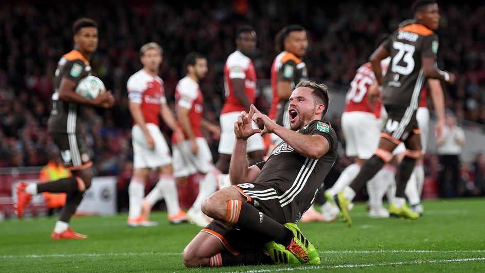 Alan Judge celebrates after scoring a free-kick against Arsenal