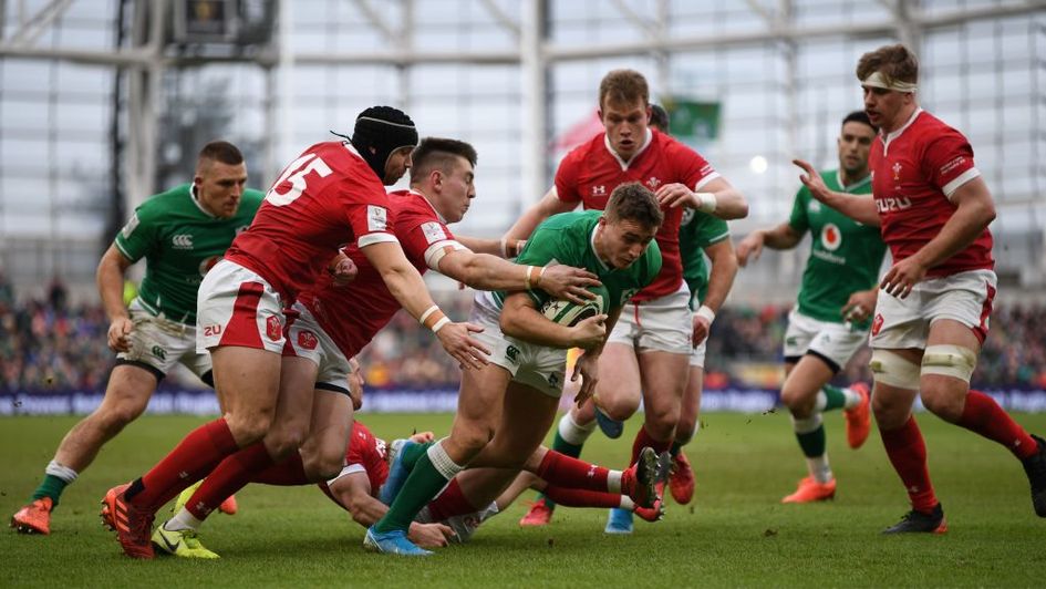 Jordan Larmour crosses for Ireland