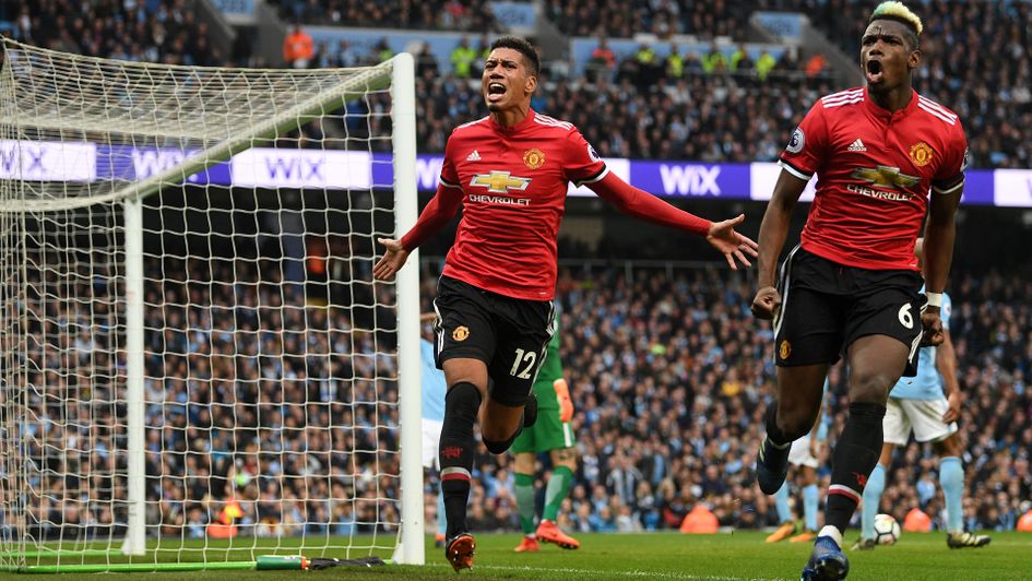 Chris Smalling and Paul Pogba celebrate