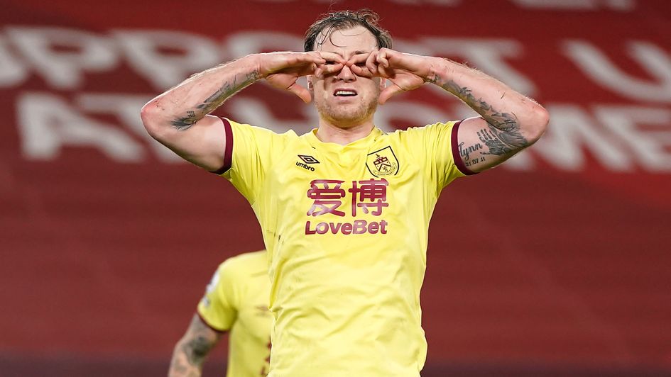 Ashley Barnes celebrates his goal at the Anfield Road end