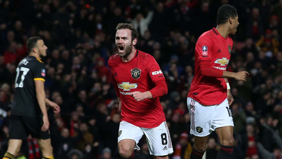 Juan Mata celebrates scoring for Manchester United