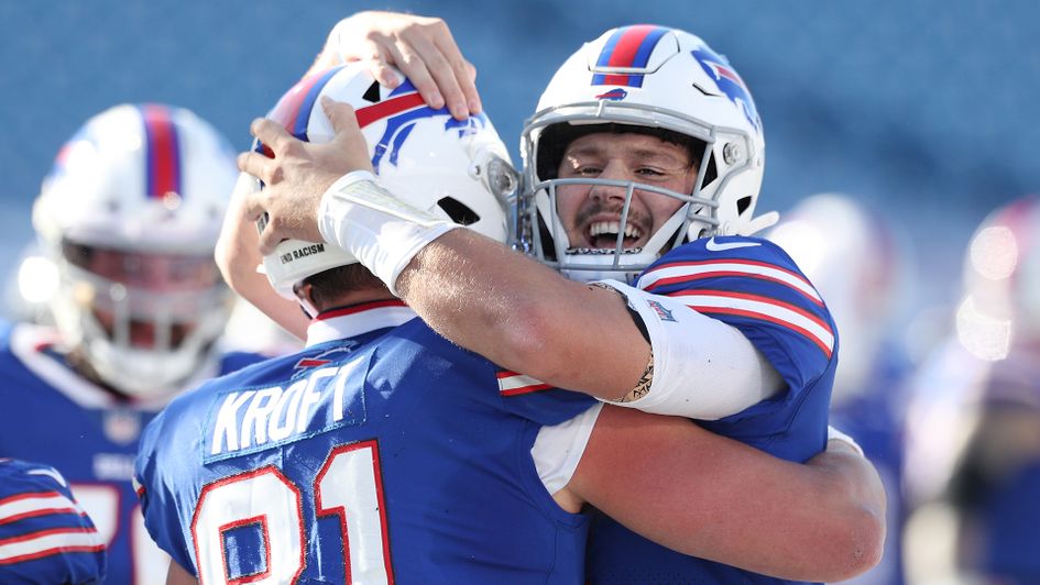 Josh Allen celebrates with Tyler Kroft