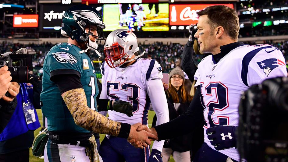 Philadelphia Eagles quarterback Carson Wentz (l) with New England Patriots' Tom Brady (r)