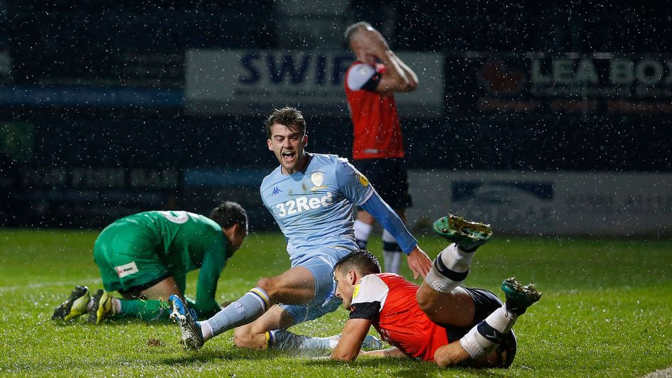 Patrick Bamford celebrates after Leeds score late against Luton