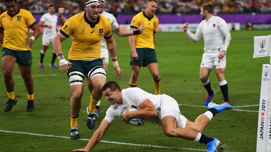 England's Jonny May scores his first of two first half tries against Australia