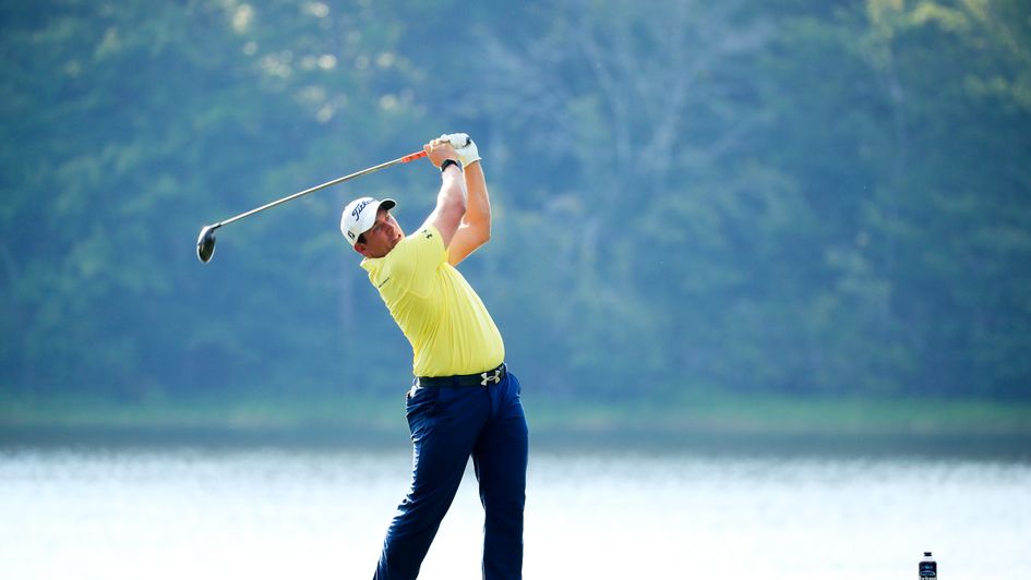 Scott Stallings leads with a round to play