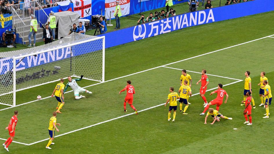 Harry Maguire heads home for England against Sweden at the World Cup