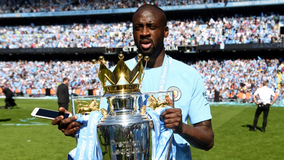 Yaya Toure celebrates winning a third Premier League title with Man City