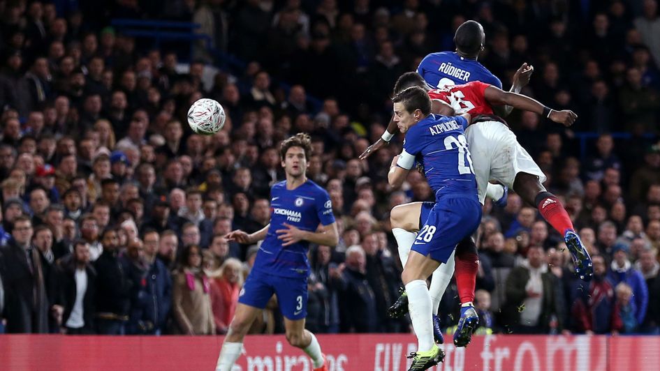 Paul Pogba heads home