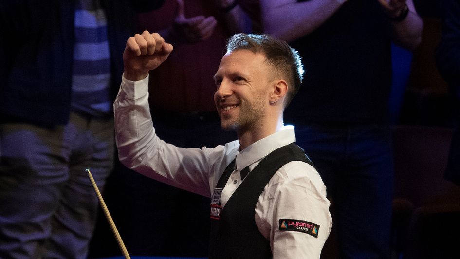 Judd Trump celebrates at the Crucible