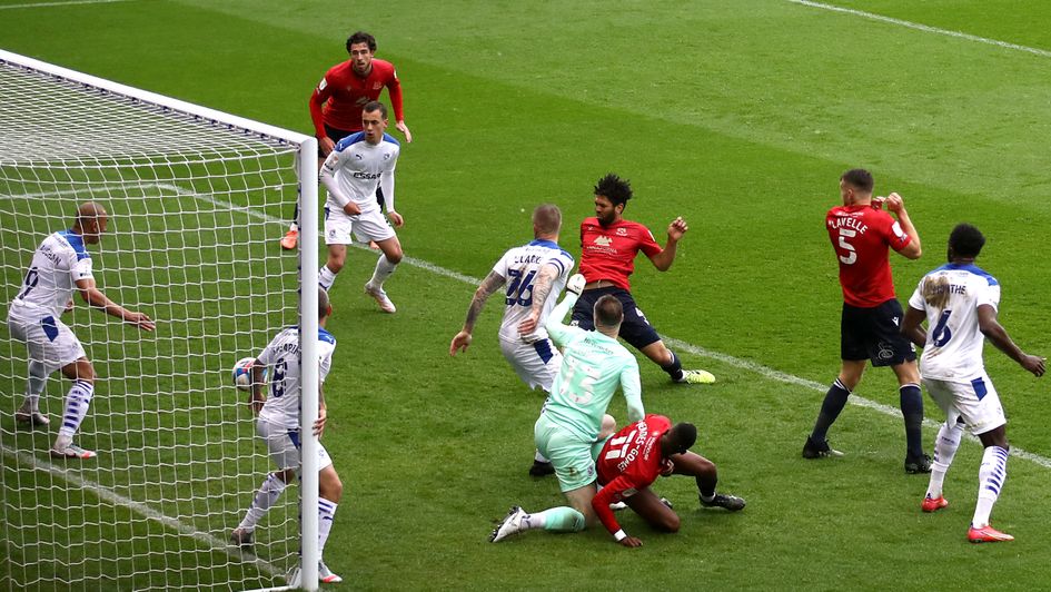 Morecambe's Nathaniel Knight-Percival scores their side's first goal of the game during the Sky Bet League two, play-off semi final