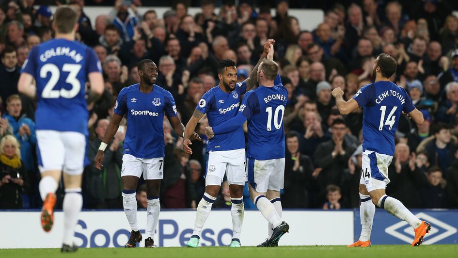 Theo Walcott celebrates scoring the only goal of the match