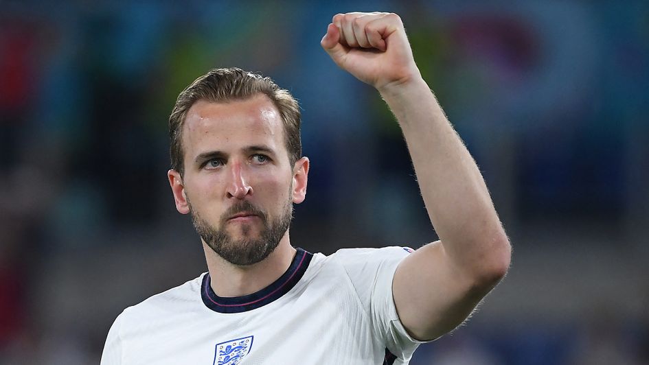 Harry Kane celebrates after victory over Ukraine