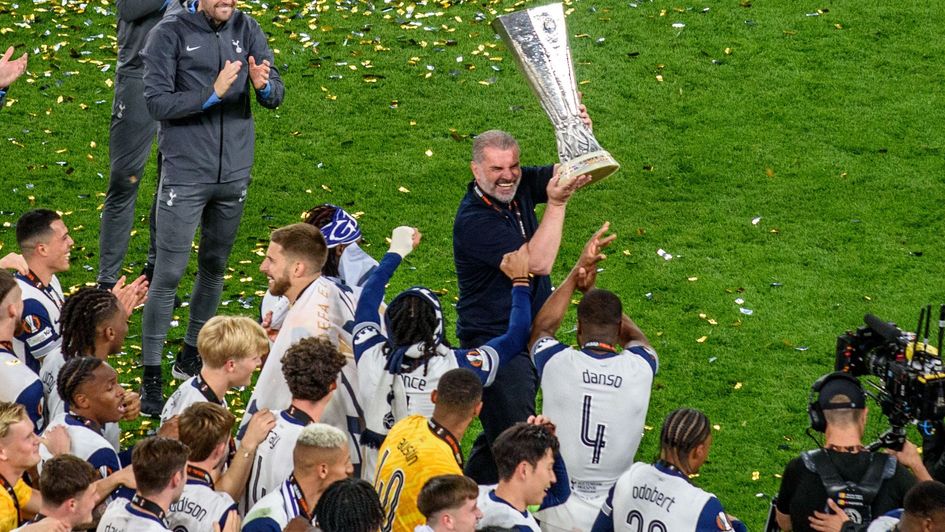 Tottenham boss Ange Postecoglou holds Europa League trophy