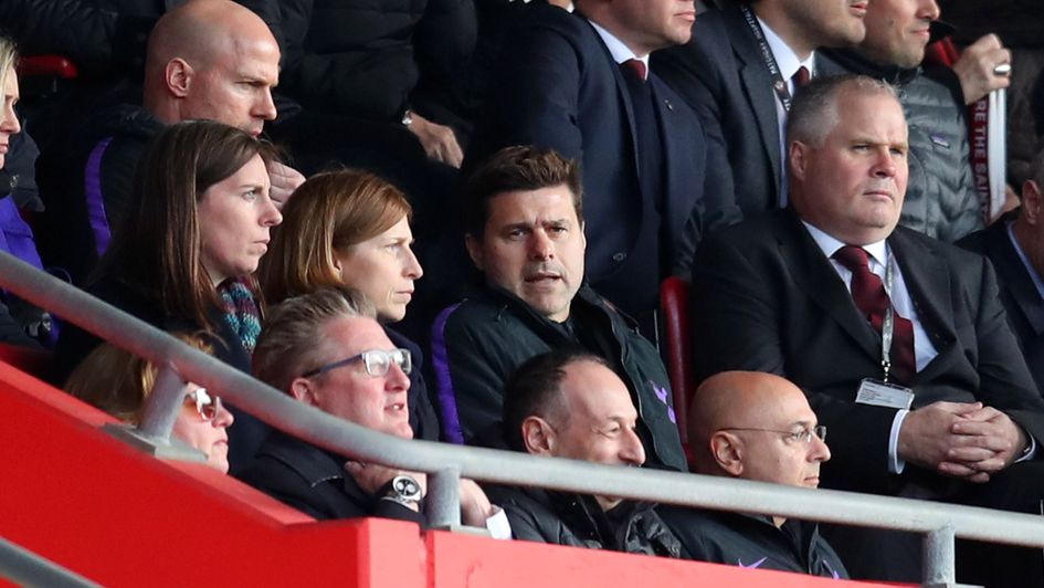 Touchline ban: Spurs boss Mauricio Pochettino watches from the stands at St Mary's