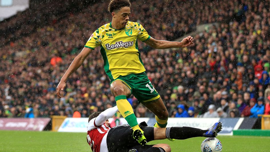 Brentford's Henrik Dalsgaard stops Norwich's Jamal Lewis