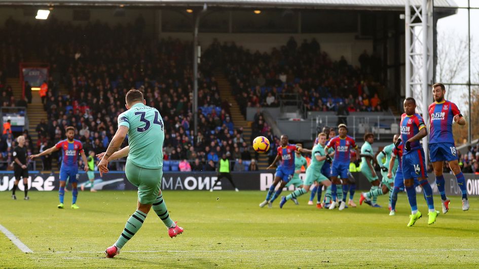 Granit Xhaka scores a free-kick for Arsenal against Crystal Palace