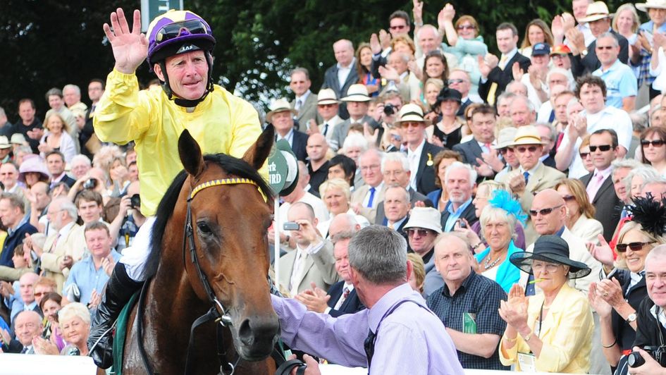 Mick Kinane enters the York winner's enclosure on Sea The Stars