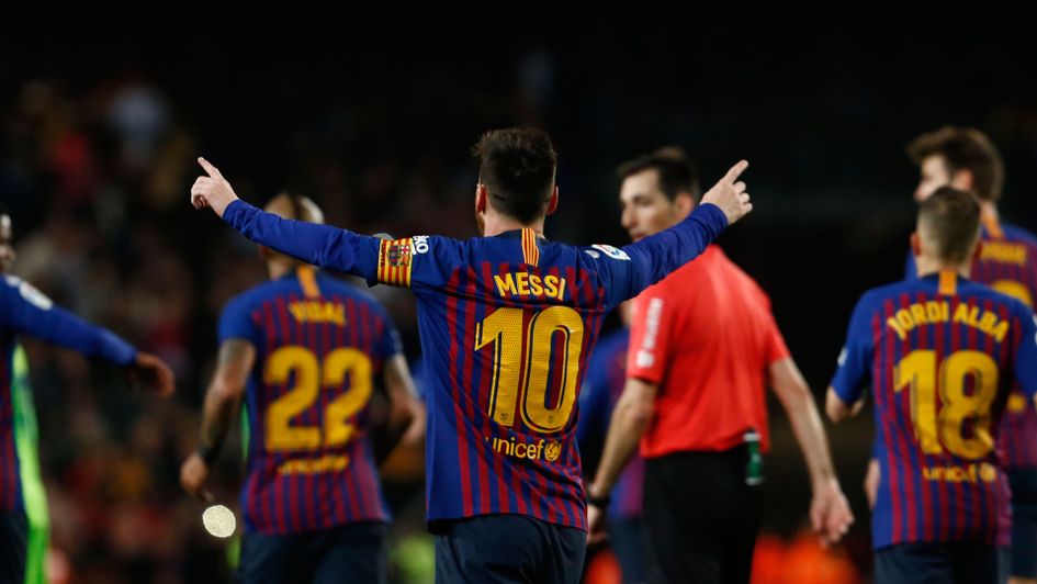 Lionel Messi celebrates scoring the winning goal for Barcelona
