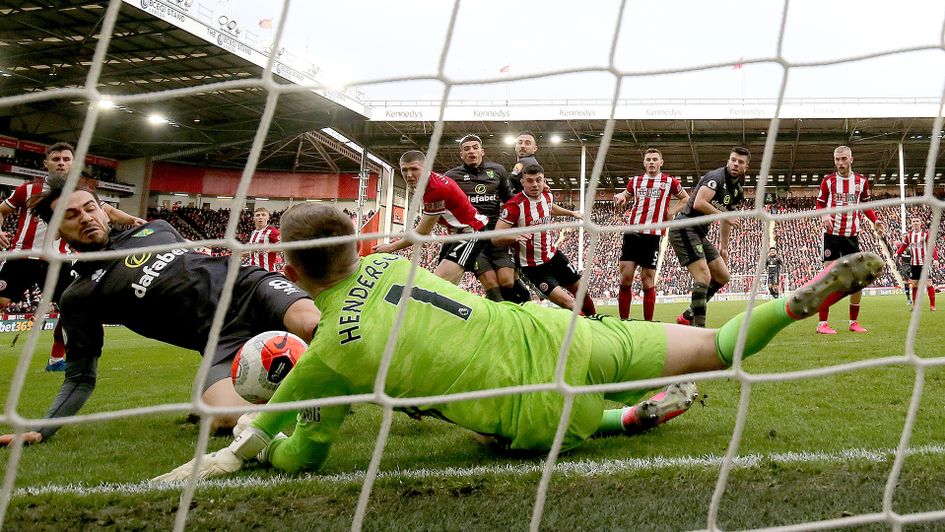 Dean Henderson makes a remarkable triple save against Norwich