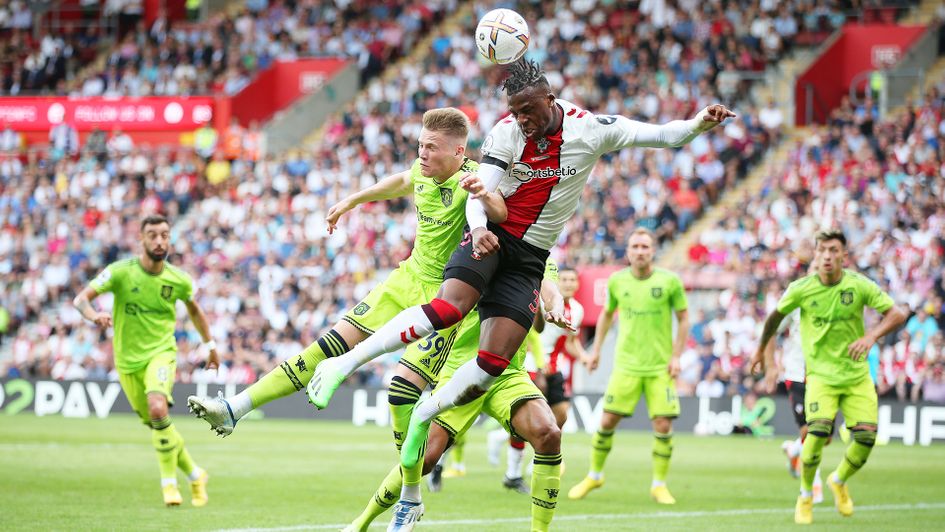 Armel Bella-Kotchap wins a header against Manchester United
