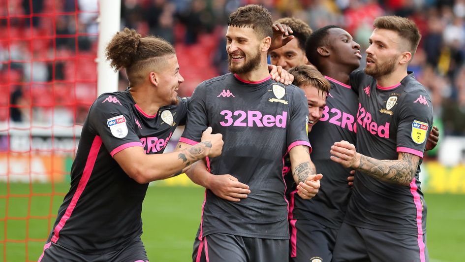 Mateusz Klich (second left): Leeds celebrate midfielder's goal against Barnsley