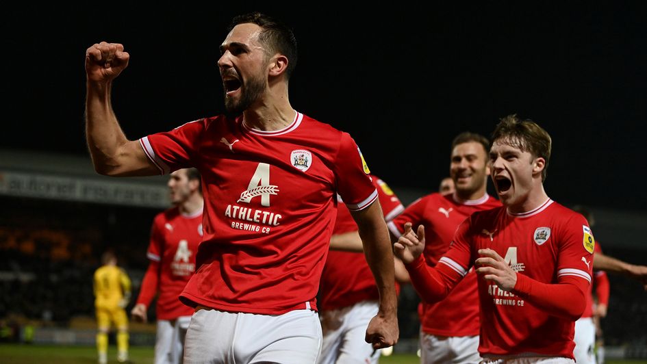 Adam Phillips celebrates a goal for Barnsley