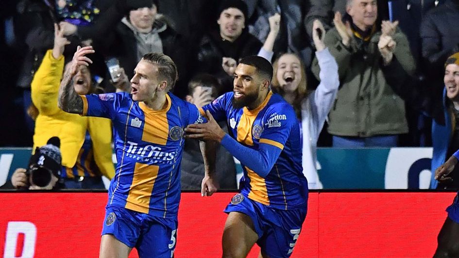 Jason Cummings celebrates scoring for Shrewsbury against Liverpool in the FA Cup
