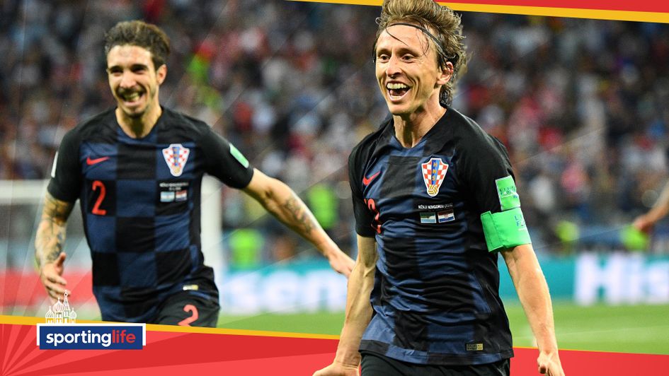 Luka Modric celebrates after scoring for Croatia