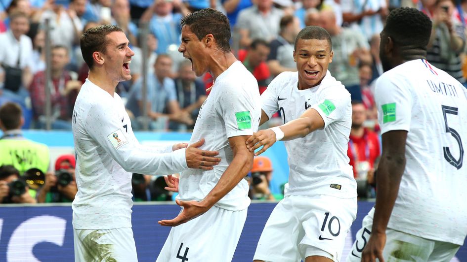 Raphael Varane celebrates his goal against Uruguay