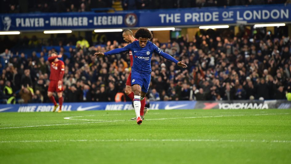 Willian: Chelsea attacker celebrates his strike against Liverpool in the FA Cup