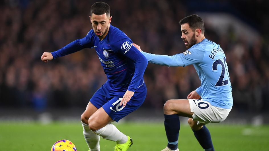 Eden Hazard looks to beat Bernardo Silva