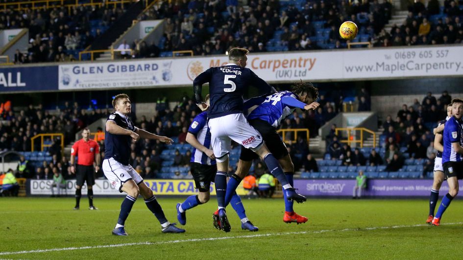Jake Cooper wins a header against Sheffield Wednesday