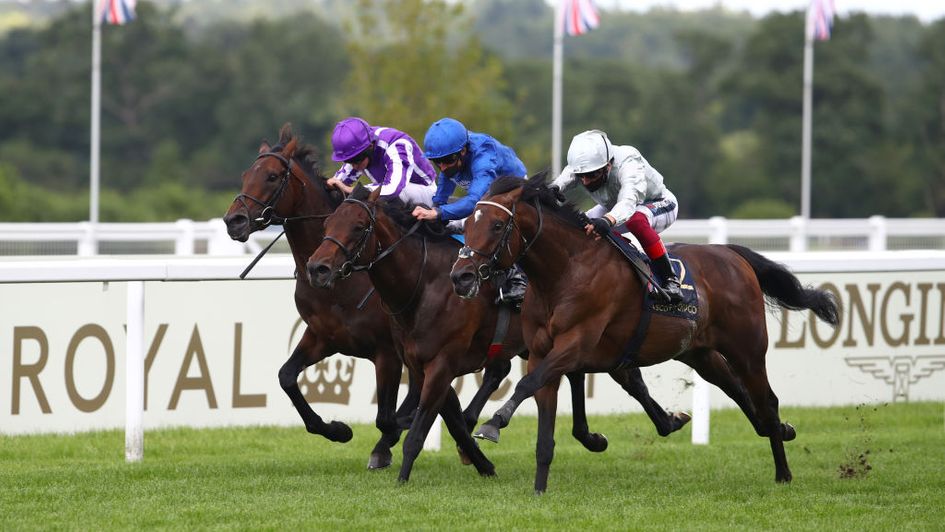 Palace Pier (right) gets on top inside the final furlong