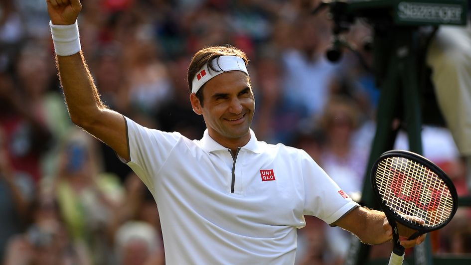 Roger Federer celebrates at Wimbledon