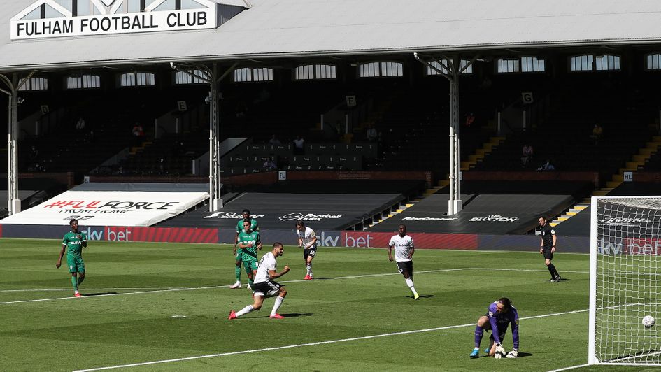 Aleksandar Mitrovic scores his penalty against Sheffield Wednesday